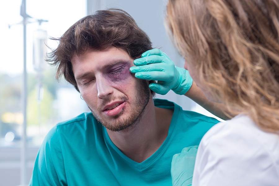 Portrait of male patient with black eye