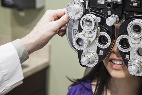 Eye exam with phoropter equipment